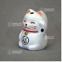 maneki neko chat blanc porte bonheur