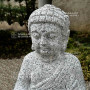 bouddha en granite 50 cm. fleur de lotus.