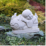 Bébé couché au grelot jizo bosatsu